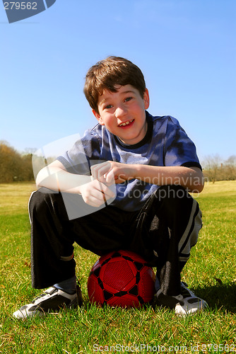 Image of Boy with soccer ball