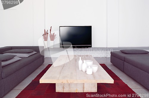 Image of living room with sofa and television
