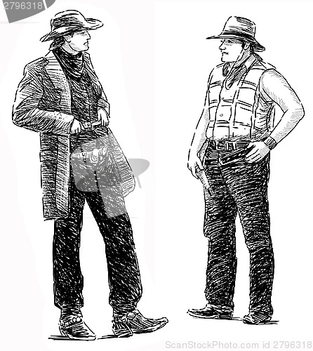 Image of two cowboys