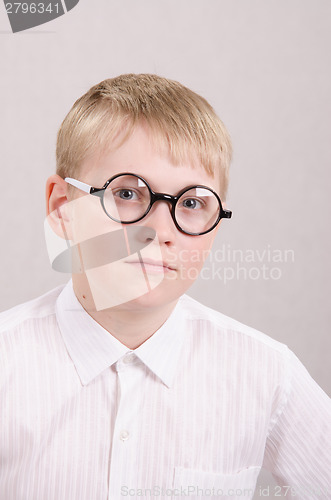 Image of Twelve year old boy with glasses