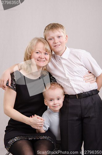 Image of Mom, thirteen and five year old son