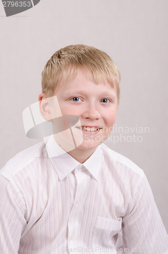 Image of Portrait of a smiling teenager twelve