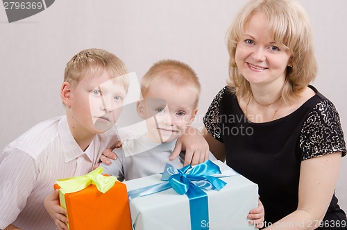 Image of Child presented with gifts
