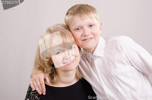 Image of Portrait of a mother son teen