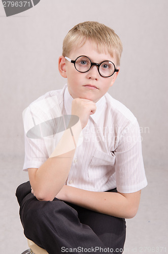 Image of Portrait a boy of twelve glasses