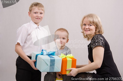 Image of Child give gifts