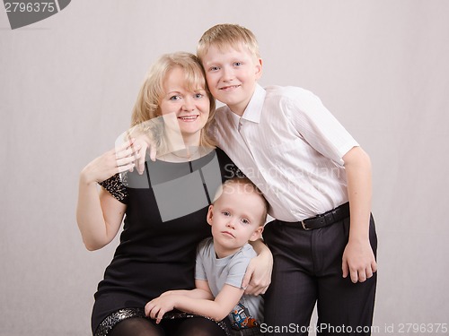 Image of Portrait of a family - mother and two children