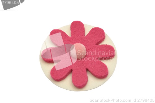 Image of Paper-thin wafer and felt decoration