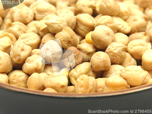 Image of One bowl of ceramic with garbanzos on white