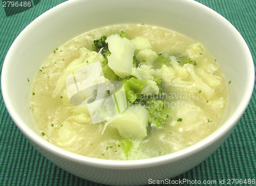 Image of Soup with cauliflower and broccoli in a bowl of chinaware