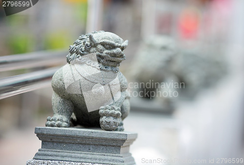 Image of Chinese lion statue in garden 