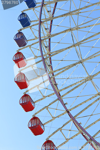 Image of Ferris Wheel against blue sky