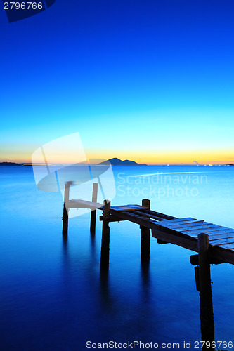 Image of Seascape with broken bridge during sunset