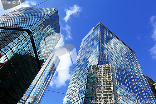 Image of Huge skyscraper with glass front in Hong Kong 