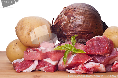 Image of Raw beef, potatoes and onion