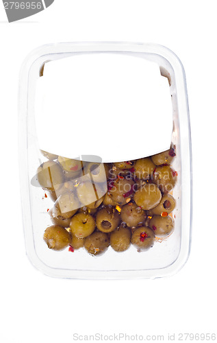 Image of olives in plastic box surface