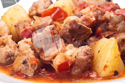 Image of beef stew, potatoes and onion