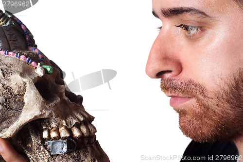 Image of student holding skull