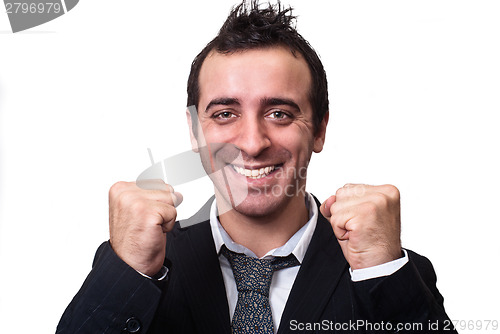 Image of young businessman enjoying success isolated on white