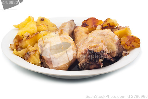 Image of grilled chicken leg and potatoes