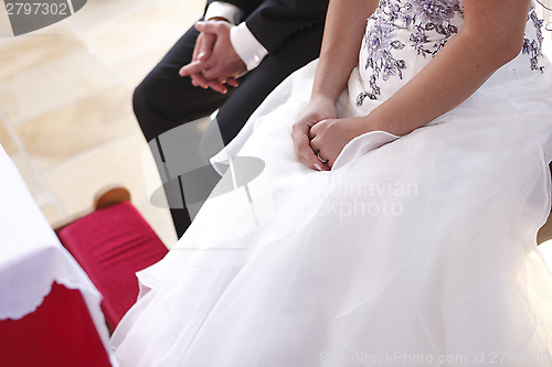 Image of Hands of a bride and groom