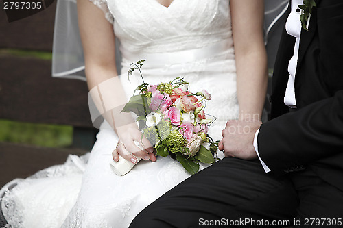 Image of Hands of a bride and groom