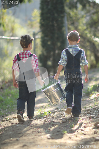 Image of Kids Working on the Farm  With a Pail