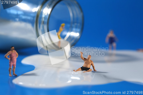 Image of Plastic People Swimming in Milk