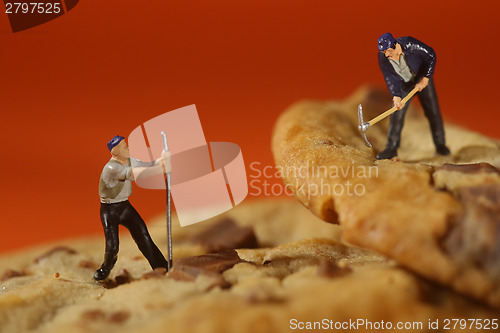 Image of  Plastic People Working on Chocolate Chip Cookies