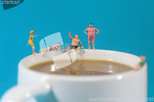 Image of Plastic People Swimming in Coffee