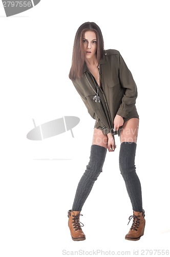 Image of Young pretty woman in boots