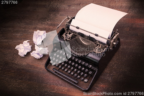 Image of Vintage typewriter and old books