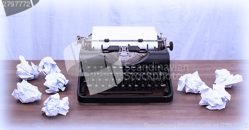 Image of Vintage typewriter and old books