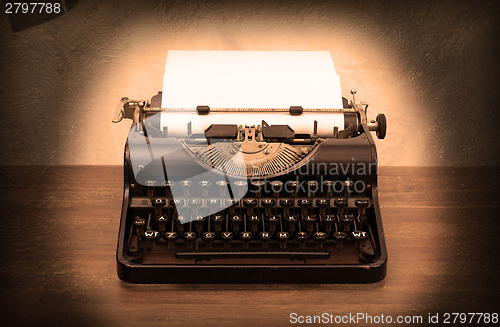 Image of Vintage typewriter and old books