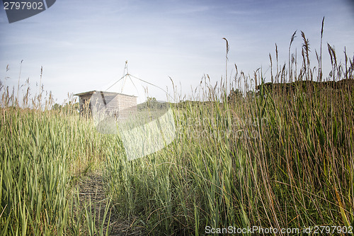 Image of Fishing shack on sea channel