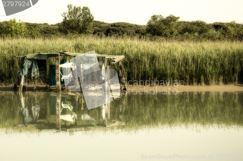 Image of Fishing shack on sea channel