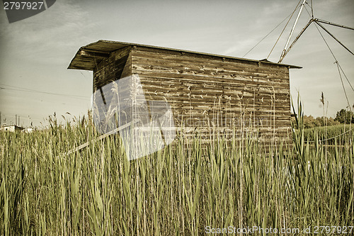 Image of Fishing shack on sea channel