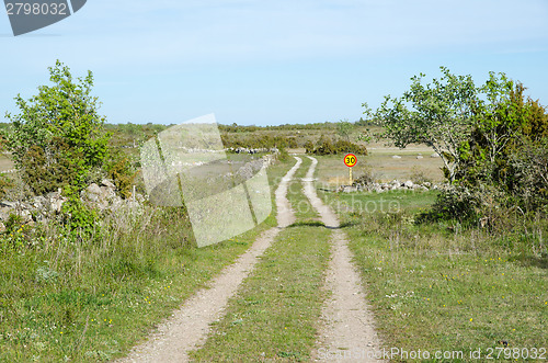 Image of Rural tracks with speed limit road sign