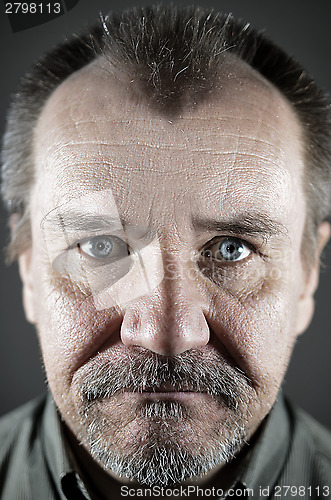 Image of caucasian  middle-aged man with a mustache and beard