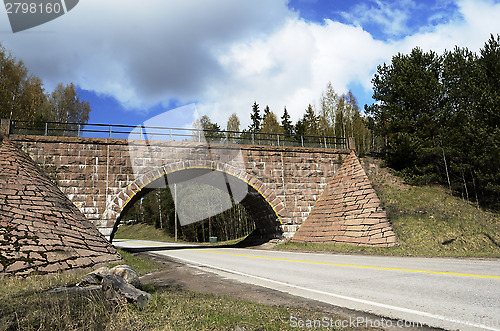 Image of stone viaduct over the road 