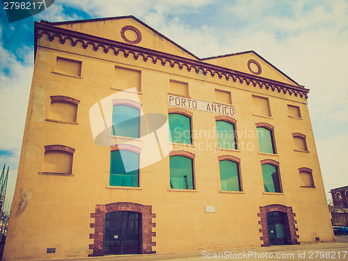 Image of Retro look Old Harbour docks in Genoa