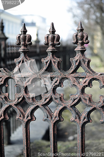 Image of close-up of an old cast iron fence