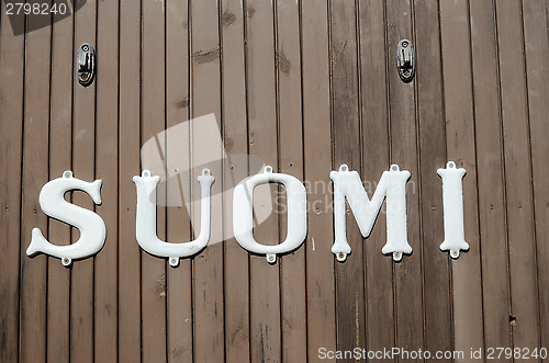 Image of vintage inscription on the railway carriage Suomi