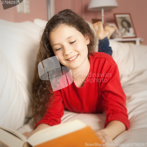 Image of girl with a book