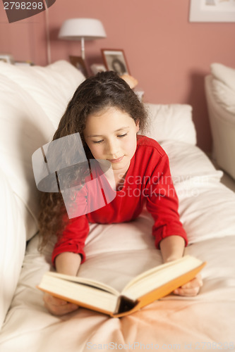 Image of girl with a book