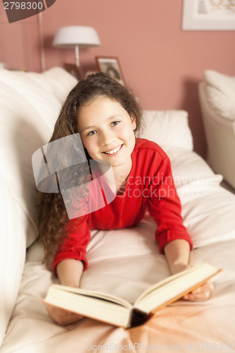 Image of girl with a book