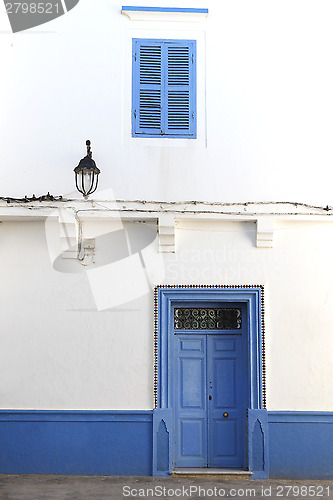 Image of Blue door in Assila