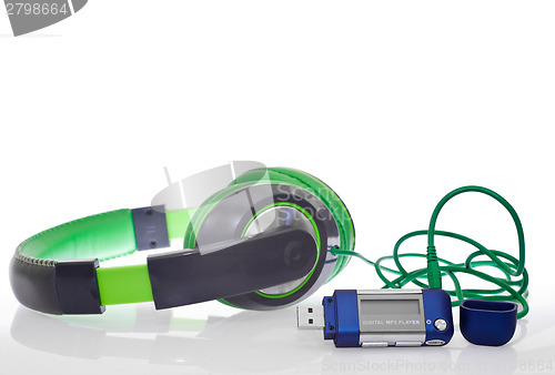 Image of music player and green headphones