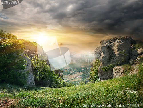 Image of Rocks and storm clouds