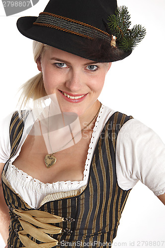 Image of Young blonde woman in traditional costume